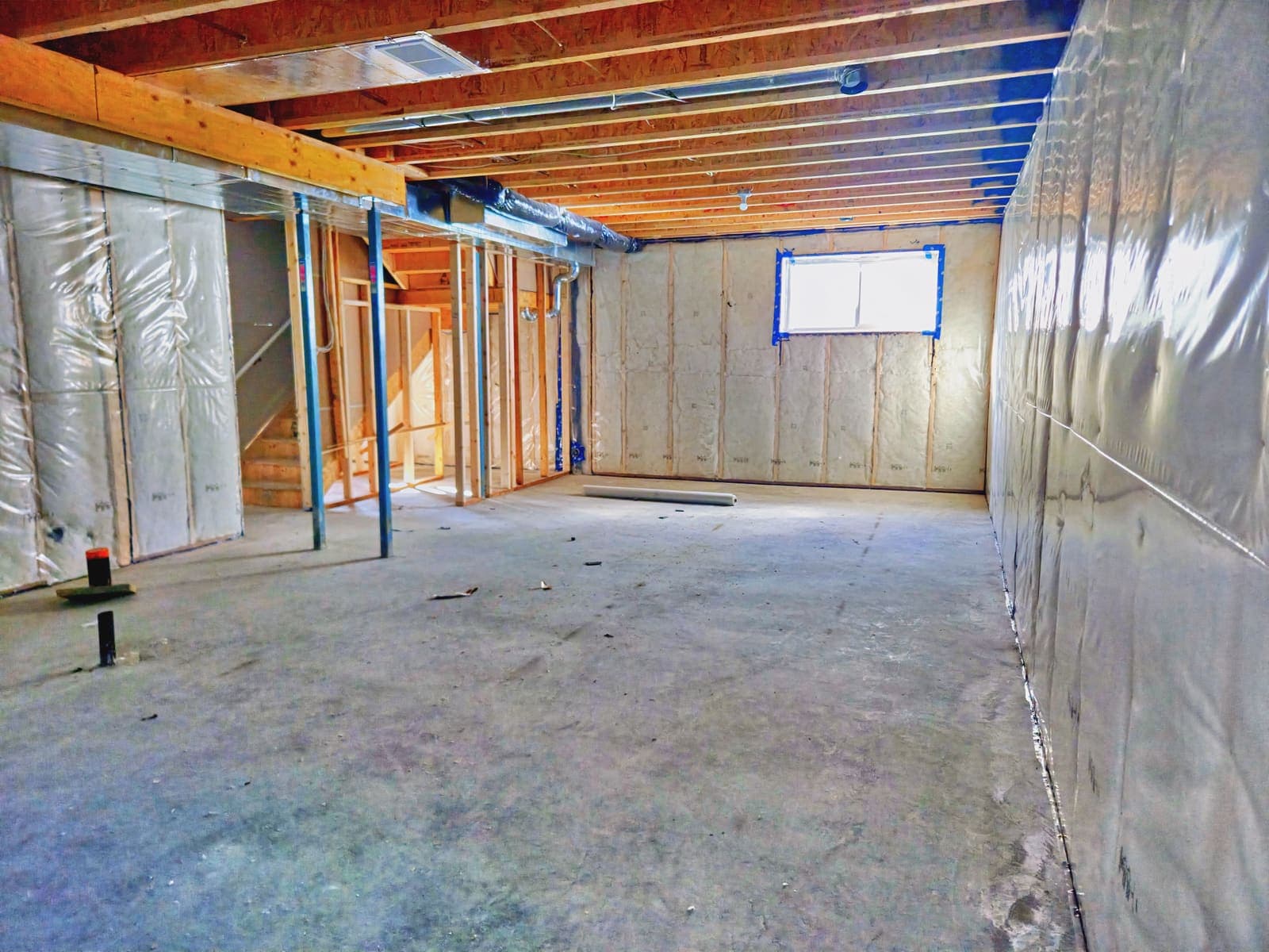 Insulated, unfinished basement ready for future development